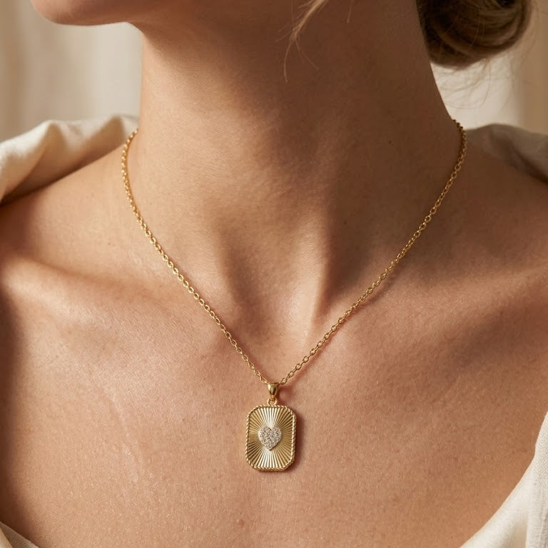 Radiant Gold Sunburst Heart Pendant