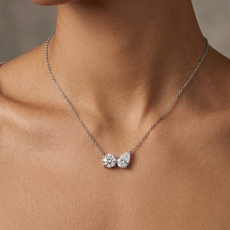 Sterling Silver Round & Pear Cut Diamond Pendant Necklace